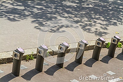 Paris, France â€“ August 23: Velib automatic bicycle hire station bike posts. Editorial Stock Photo